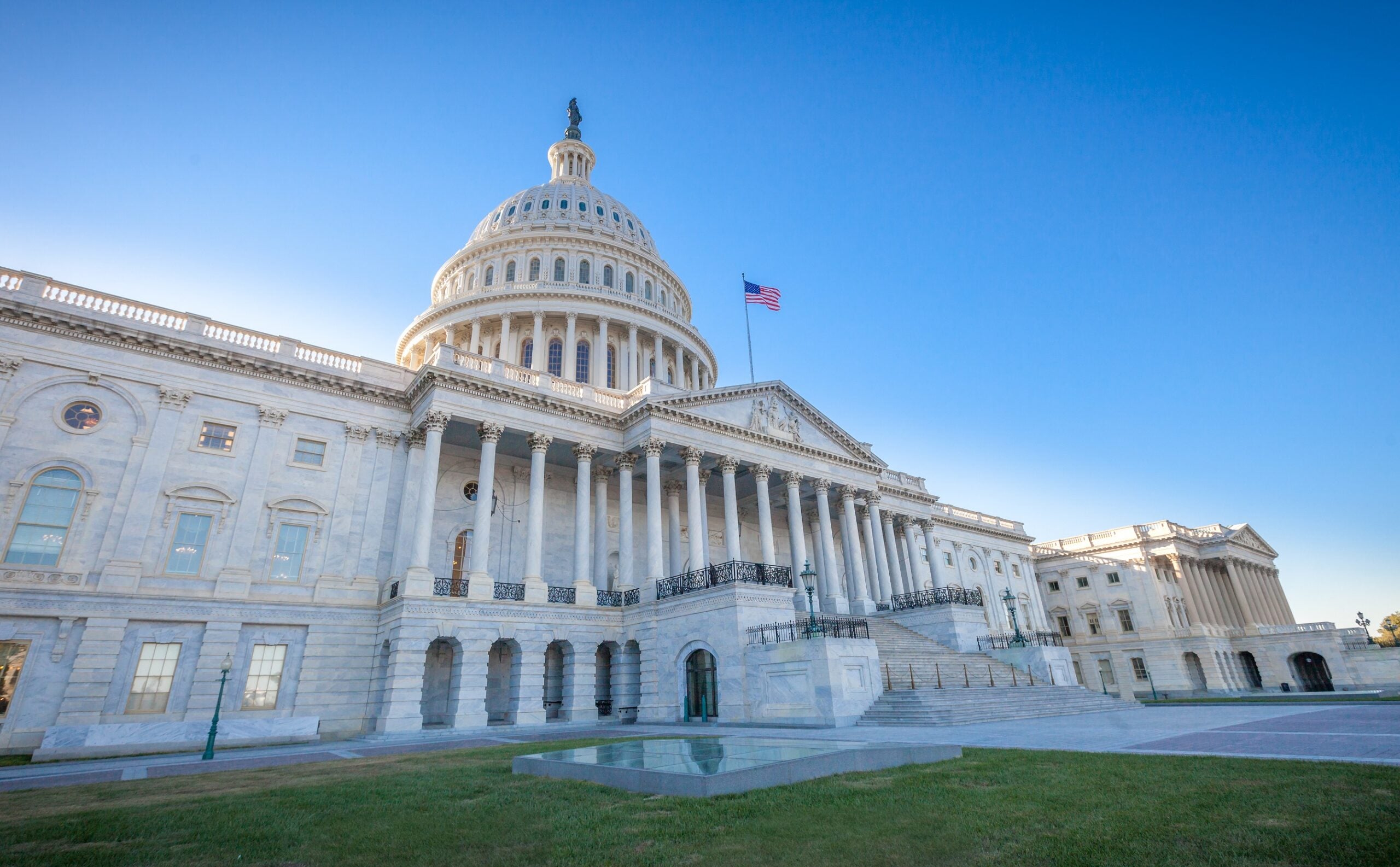 Low angled view of the U.S. Capitol East Facade Front in Washington, DC.